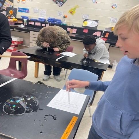 8th grade student celebrating pi day