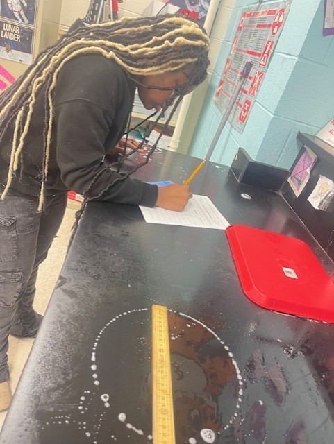 8th grade student celebrating pi day