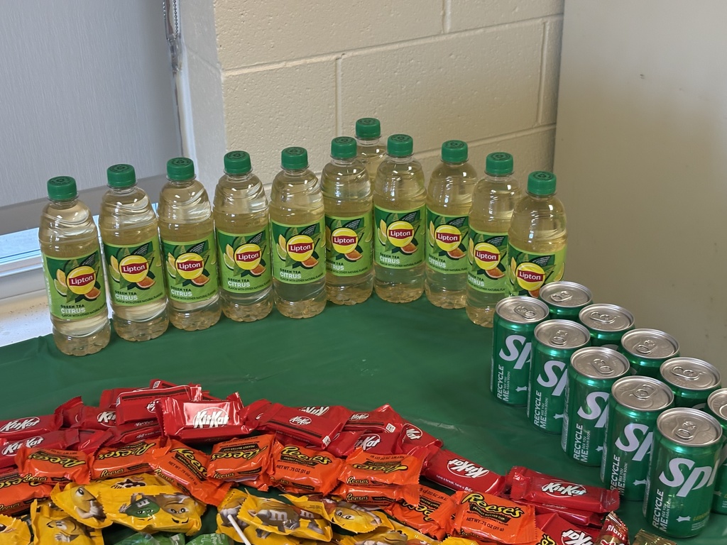 A colorful table of drinks and goodies for our educators.