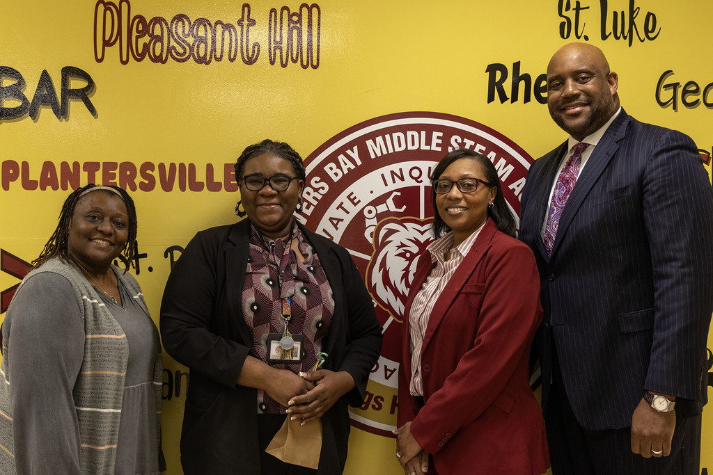 Carvers Bay Middle STEAM Academy - LaShawna Armstrong(second from left) pictured with District and school administration
