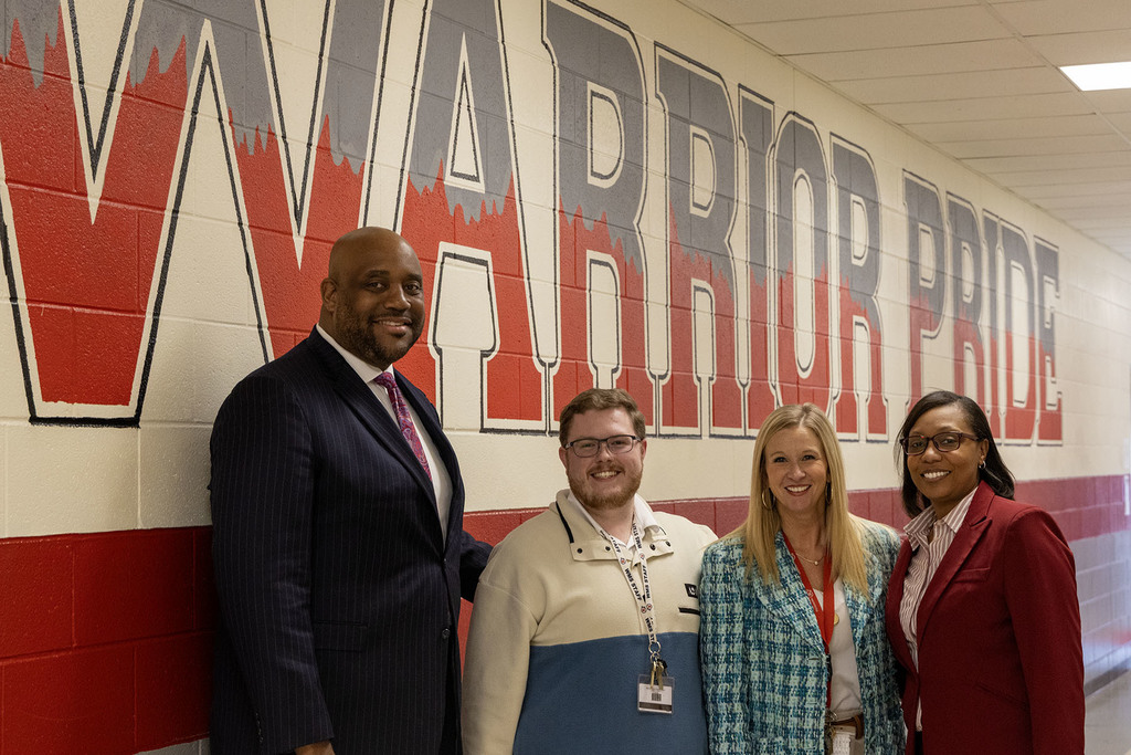 Waccamaw Middle/Waccamaw Intermediate School - Mason Collins (second from left) pictured with school and District administration