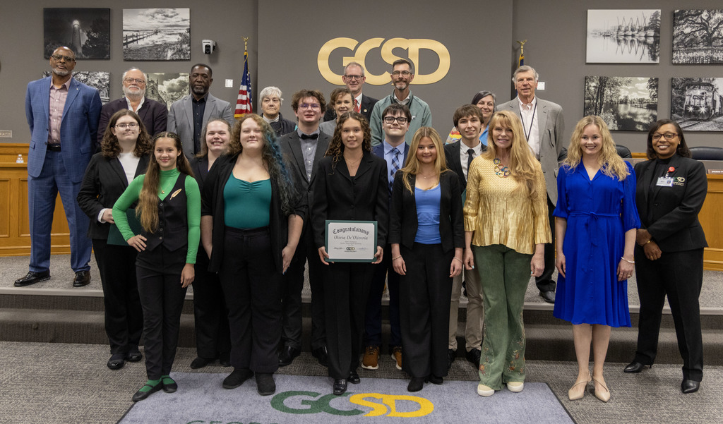 WHS Windtalkers pictured with GCSD Board of Trustees, WHS principal Dr. David Hammel, and Superintendent Dr. Bethany Giles