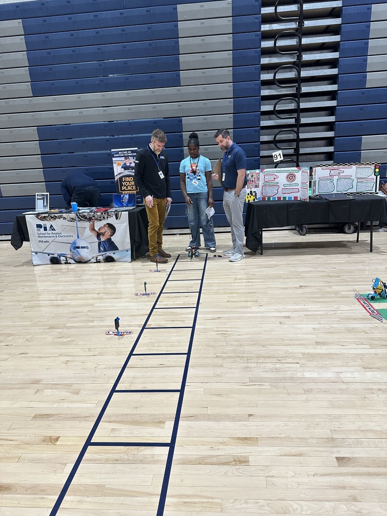 Sianna getting judged on her project.