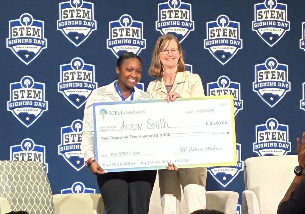 Aeryn Smith accepts her scholarship at the 10th annual STEM Signing Day