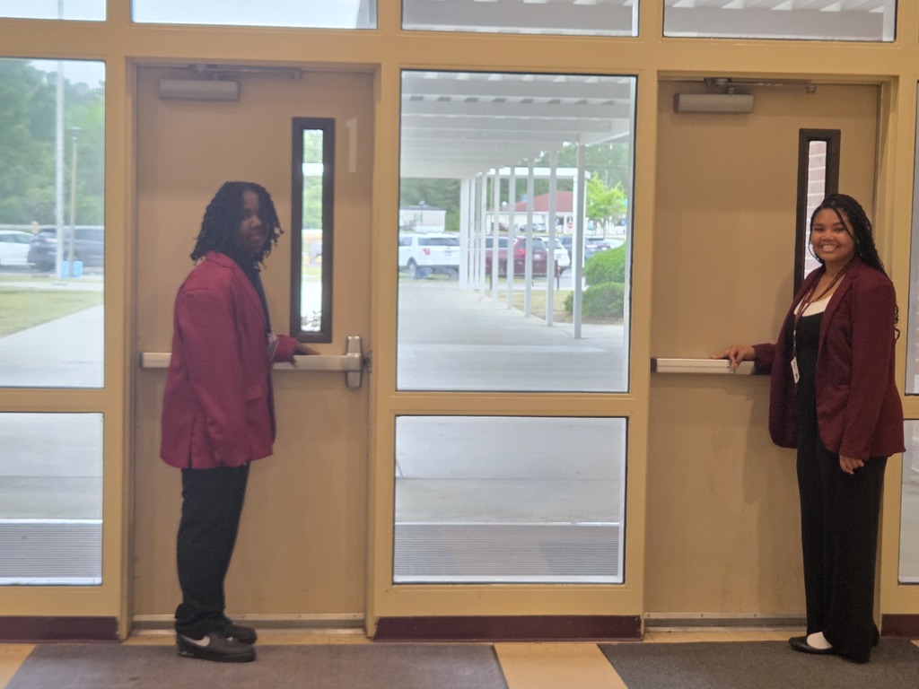 Two of our AVID leaders ready to usher the 5th graders into our school.
