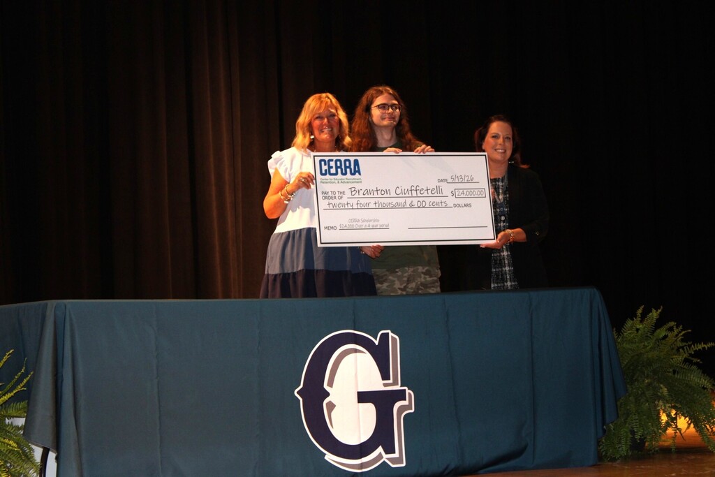 Branton Ciuffetelli was recently selected for Teaching Fellows at Charleston Southern University. Ms. Blount and Dr. Hering worked together to organize a brief ceremony to celebrate his achievements. Ms. Blount did an amazing job recognizing Branton for not only his academic achievements, but his hard work, his character, and his perseverance to submit his portfolio. In Teacher Cadets, Branton was given opportunities to plan, observe, model, and provide instruction. These experiences, as well as others, have allowed him to develop the essential skills (critical thinking, collaboration, reading, writing, and relationship building) that make our students College and Career Ready.