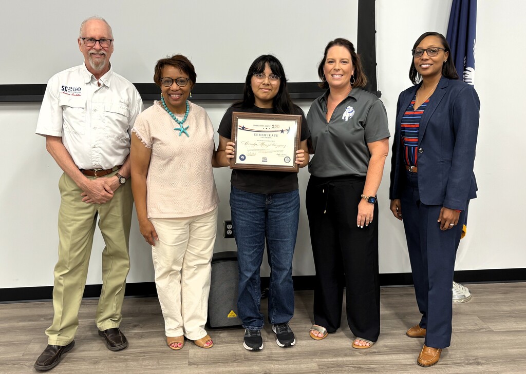 We are incredibly proud of our students who were recognized in the Georgetown County Friends of the Georgetown Library Time Capsule Essay Contest, celebrating our nation's 250th Anniversary! A special congratulations to Mikalyn Holmes for earning 1st Place with her outstanding essay! We also want to recognize Cindy Vazquez Manzo and Bevin Grant for their exceptional work and for being honored in this year's contest. #BulldogPride #GHSBulldogs #GeorgetownLibrary #FriendsoftheLibrary