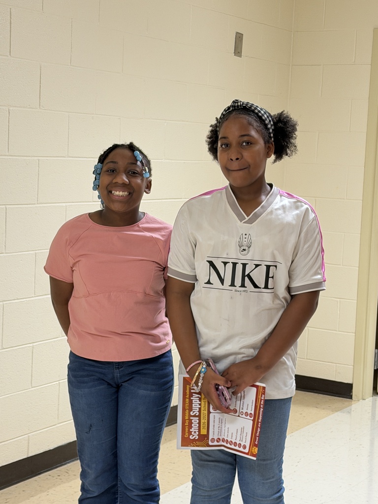 Rising 6th graders standing in the hallway