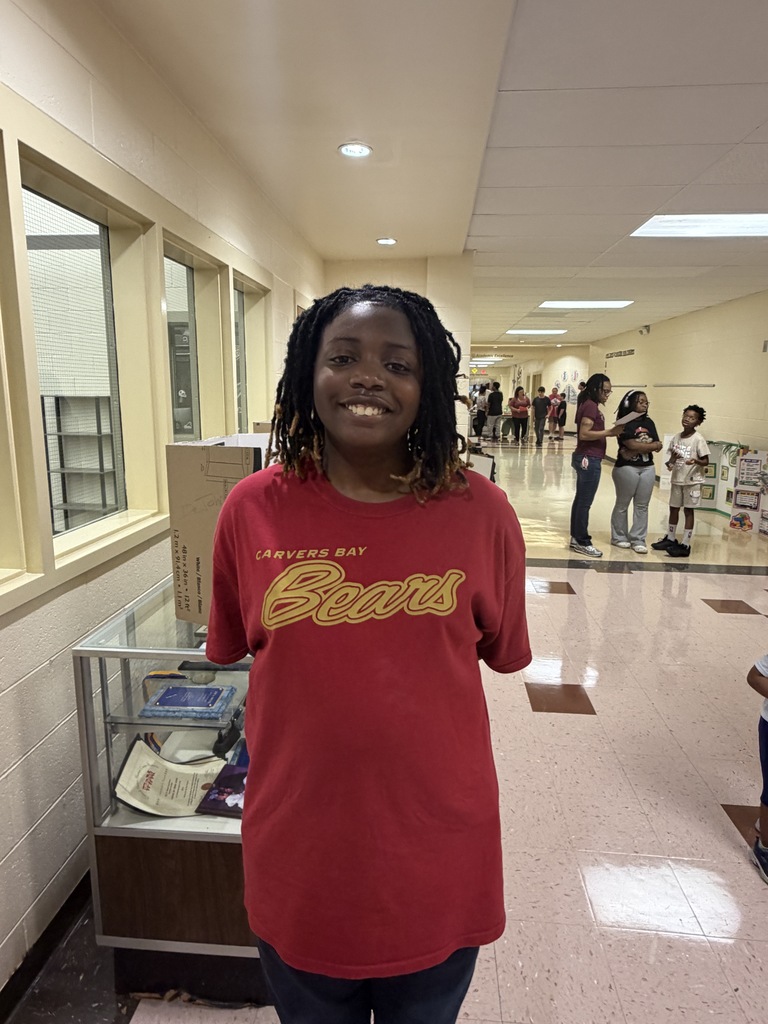 New sixth grade student standing in the hall