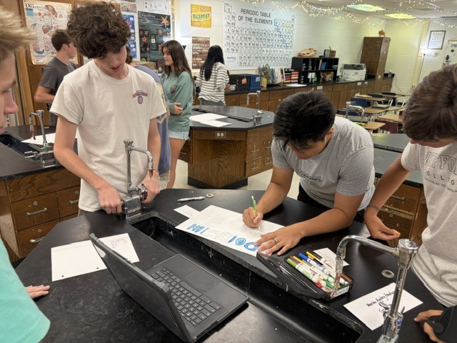students working on Marine mystery challenge 3