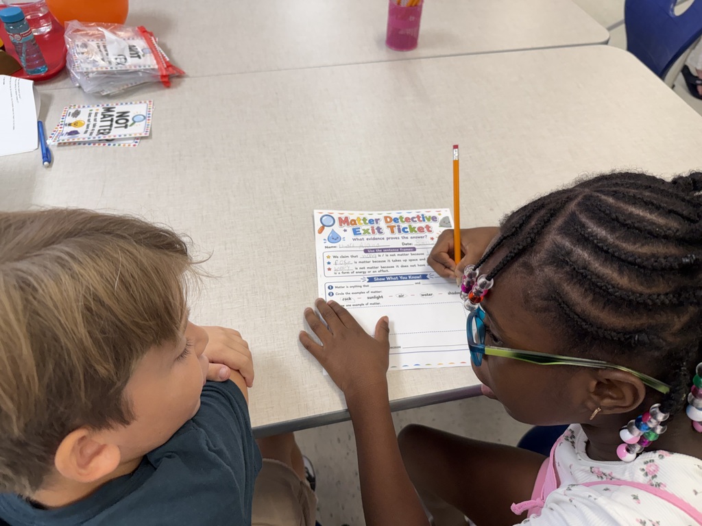 Ms. Lewis's 2nd graders identifying types of matter. 1