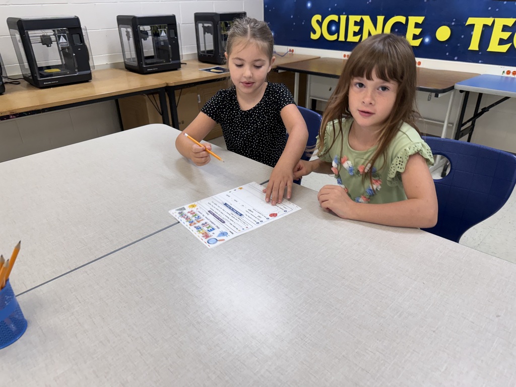 Ms. Lewis's 2nd graders identifying types of matter. 1