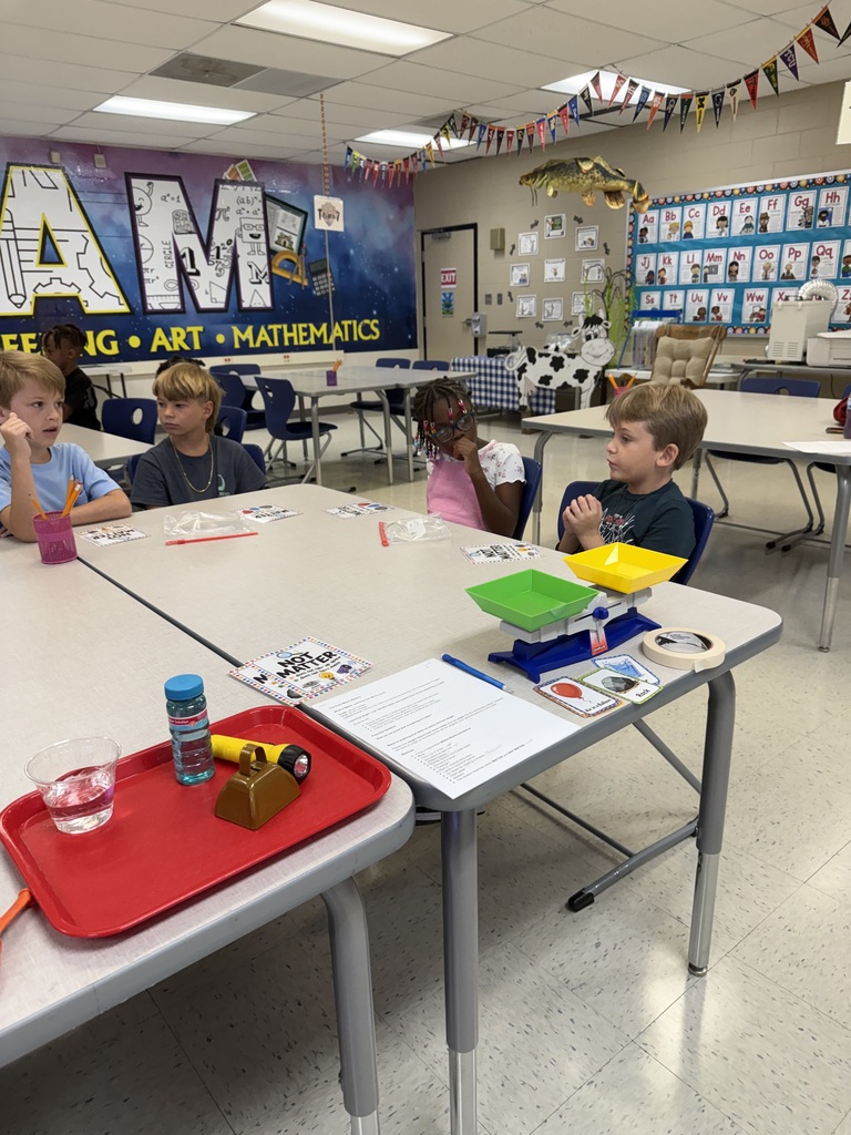 Ms. Lewis's 2nd graders identifying types of matter. 1