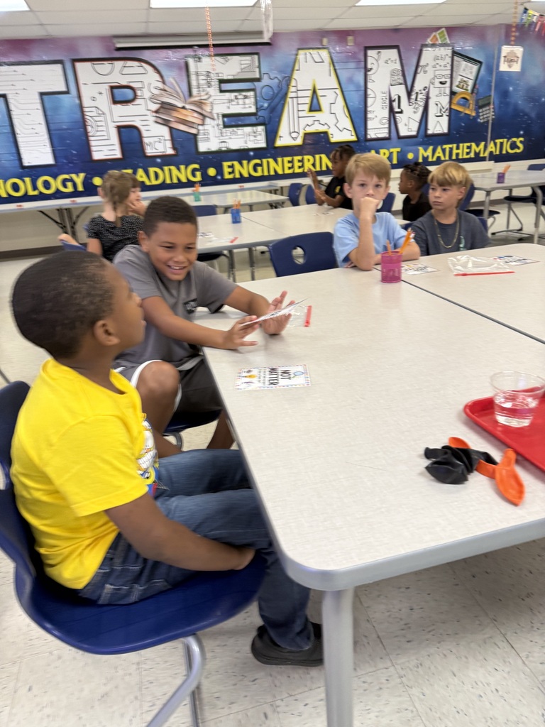 Ms. Lewis's 2nd graders identifying types of matter. 1