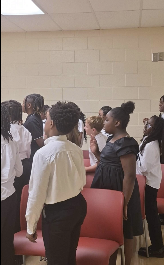 Students taking pledge during Beta