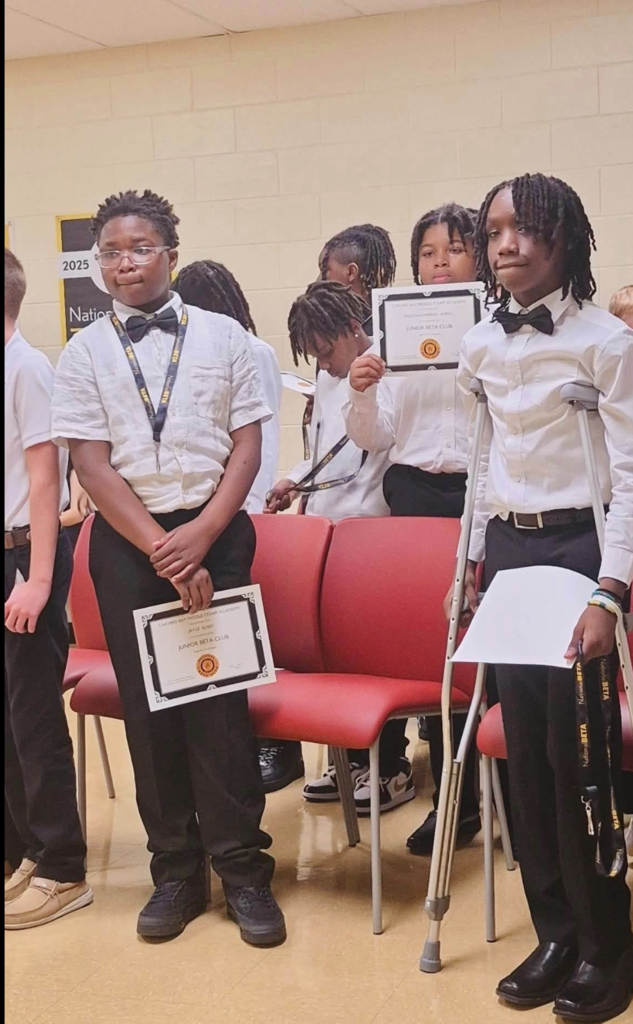 Kids being inducted into the Beta Club.