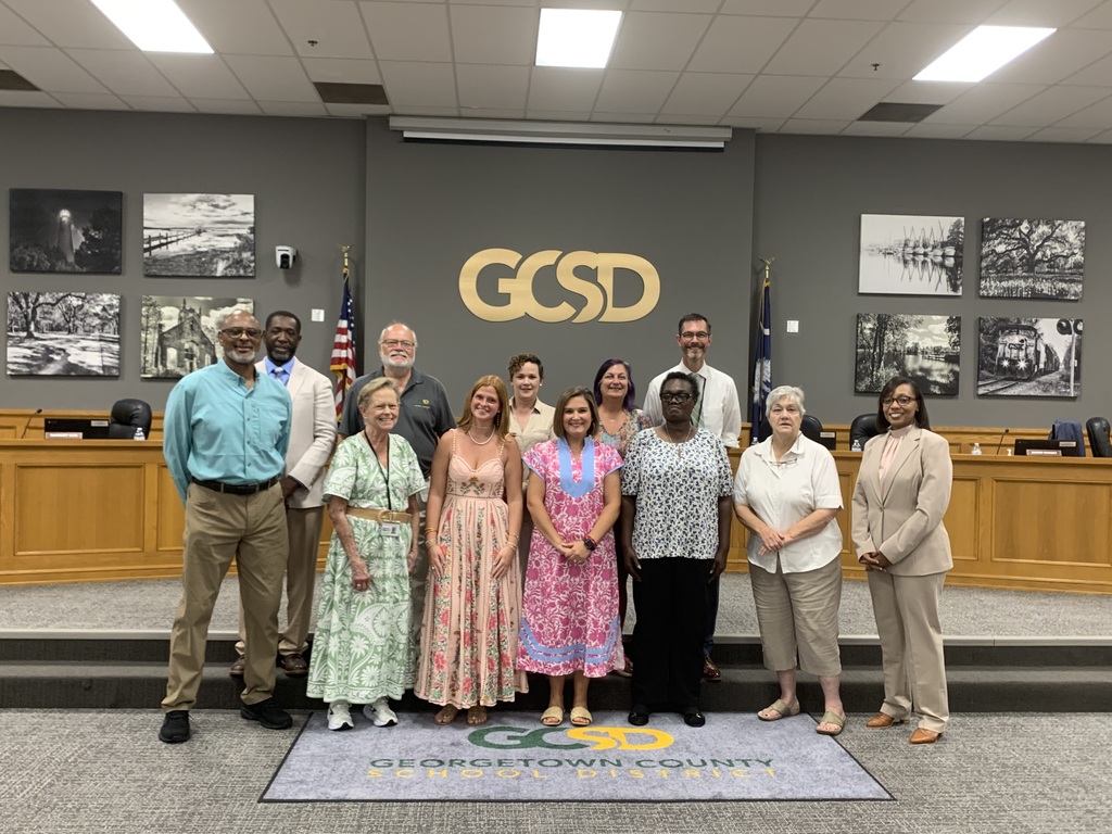 September #TeamGCSD IMPACT Award recipients pictured with the GCSD Board of Trustees and Superintendent Giles