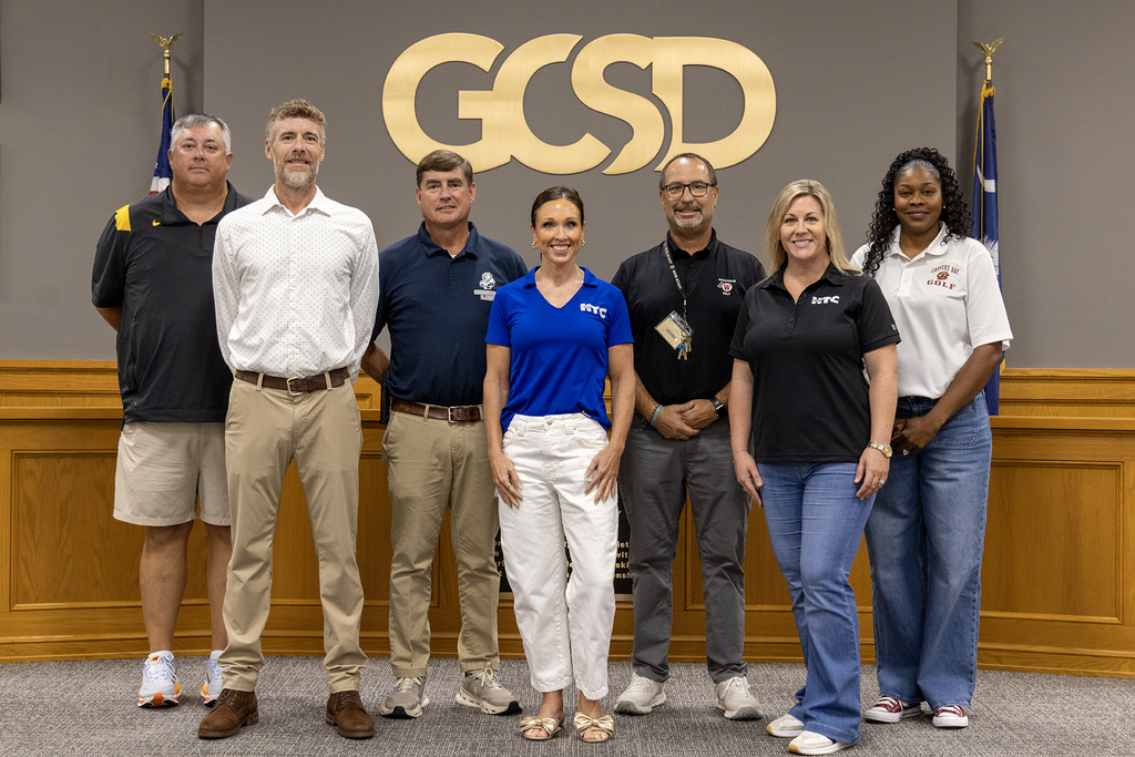 HTC representatives (front row) pictures with Scott Durham (AHS), Brian Clark (GHS), Todd Rodenbeck (WHS), and Nicole Tucker-Young (WHS)
