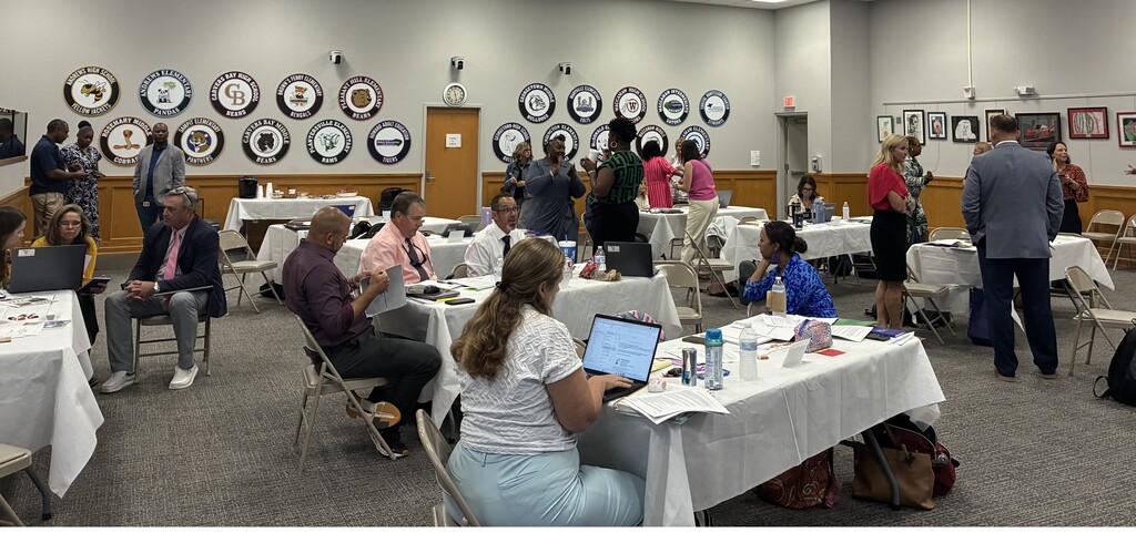 September 10 Joint Leadership Meeting - Principals and district staff conversing with each other