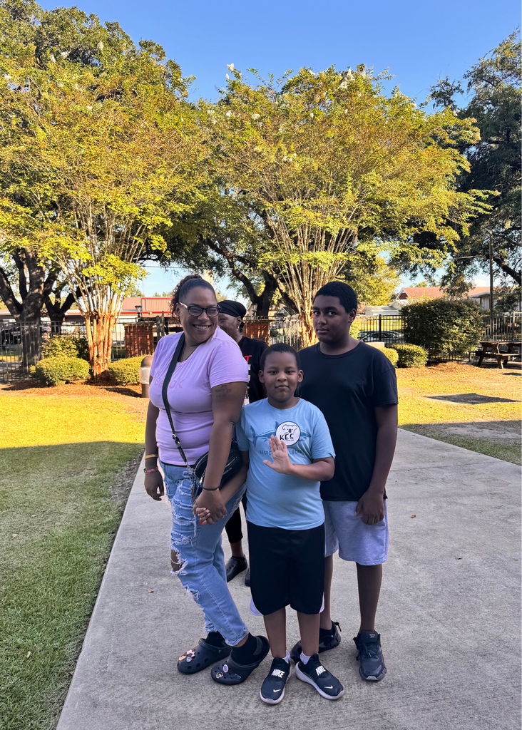 GCAE Student and family posing for a photo.