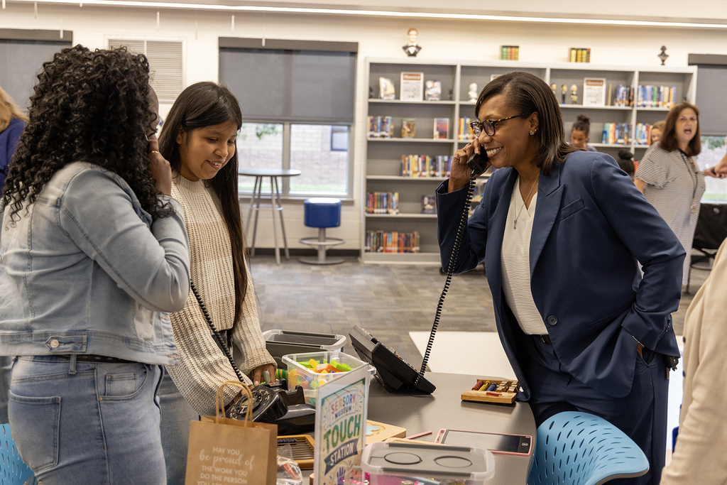 Dr. Giles interacts with students at GMS's sensory museum.