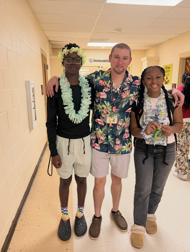 Students and football players sporting a Hawaiian themed football gamed day at CBMSA