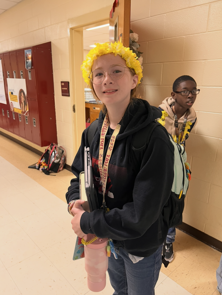 Students and football players sporting a Hawaiian themed football gamed day at CBMSA