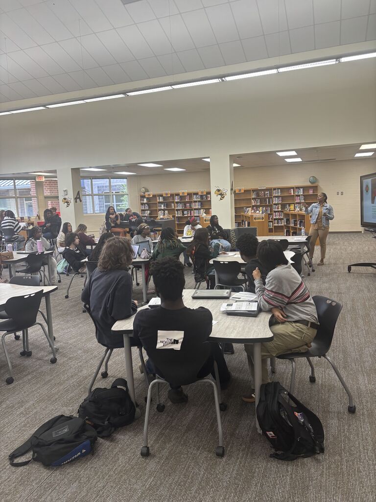 Students listening to FAFSA conversation