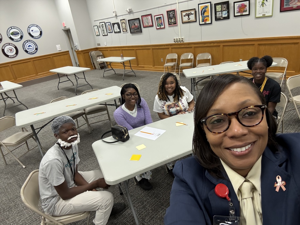 Superintendent Giles takes a selfie with members of the Superintendent's Advisory Council
