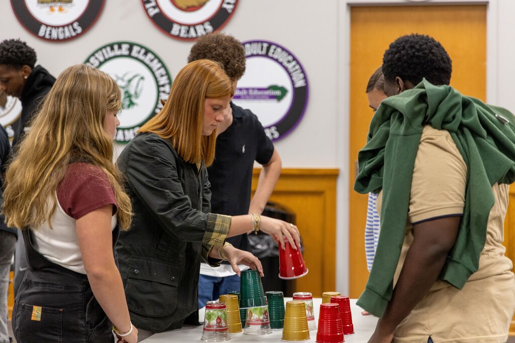 Members of the Superintendent's Student Advisory Council playing the 4-Cup Challenge