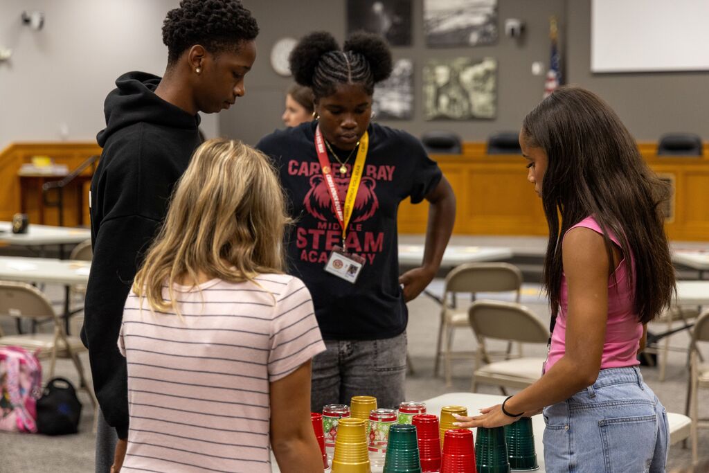 Members of the Superintendent's Student Advisory Council playing the 4-Cup Challenge