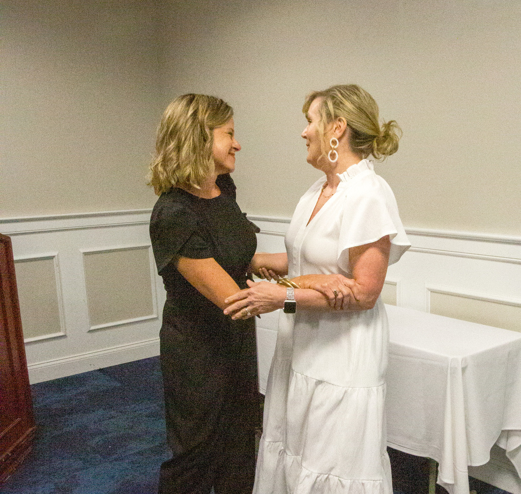 AES principal Adrienne Watford congratulates GCSD's 24-25 Teacher of the Year Michelle Marshall