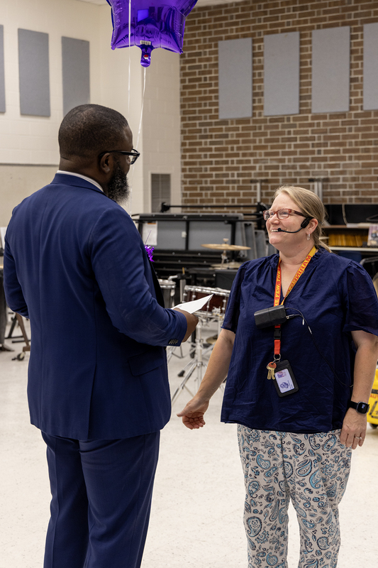 Craig King from PSTA notifies Laura Cameron that she is the recipient of a PSTA grant
