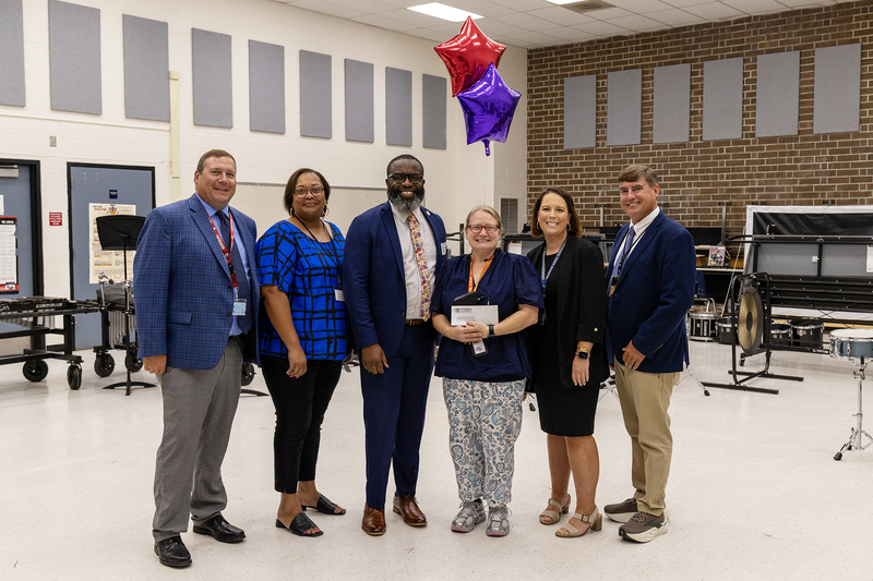 Administration team from GHS pictured with Craig King (center left) and Laura Cameron (center right)