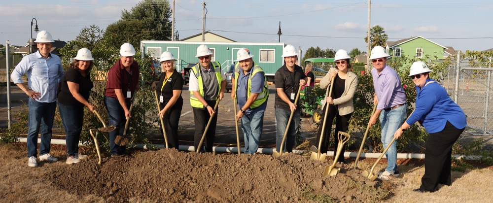 group of Gervais School District staff posing for a groundbreaking