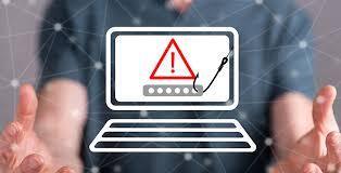 Hadns reaching on either side of a holographic laptop image with a warning symbol and fishhook on the screen