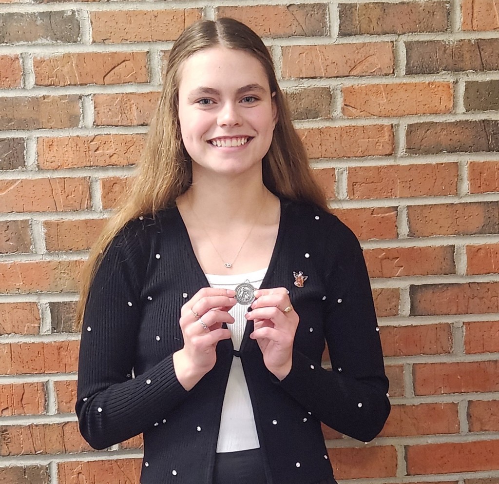 Clare Cordell advances to the State Oral Interp. Competition