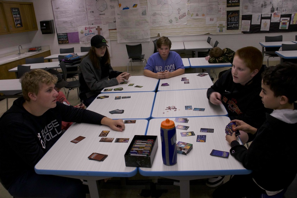 Students playing a board game