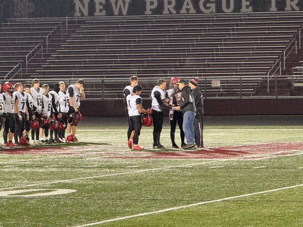 Football team getting trophy