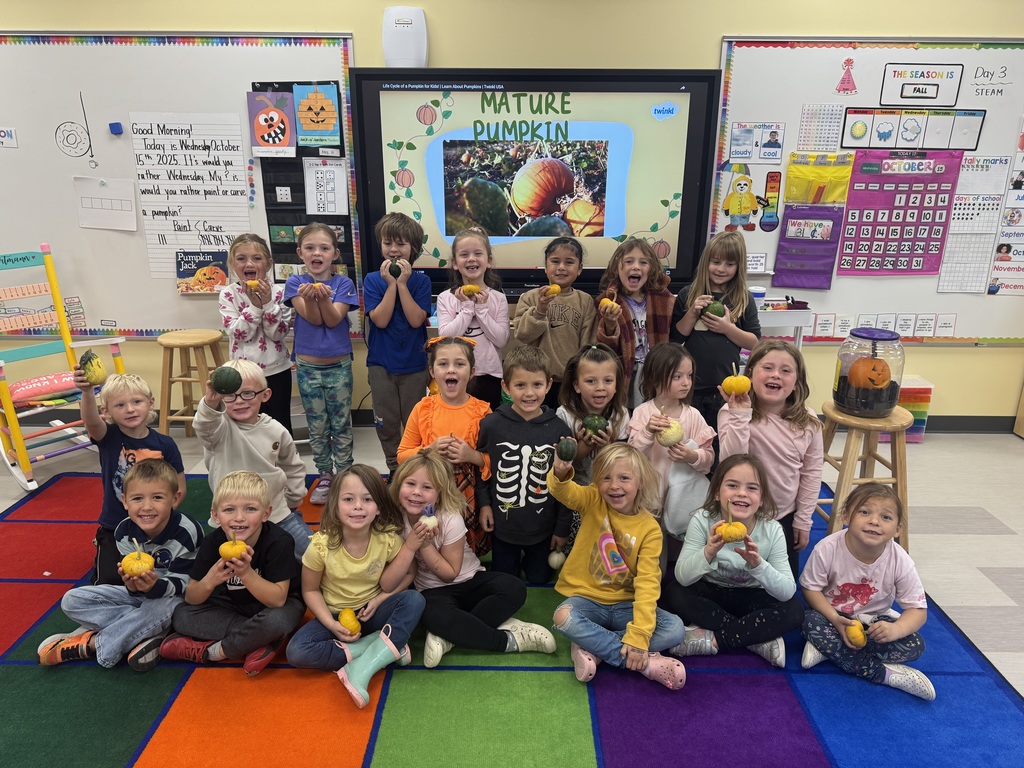 Kindergarten class with pumpkins