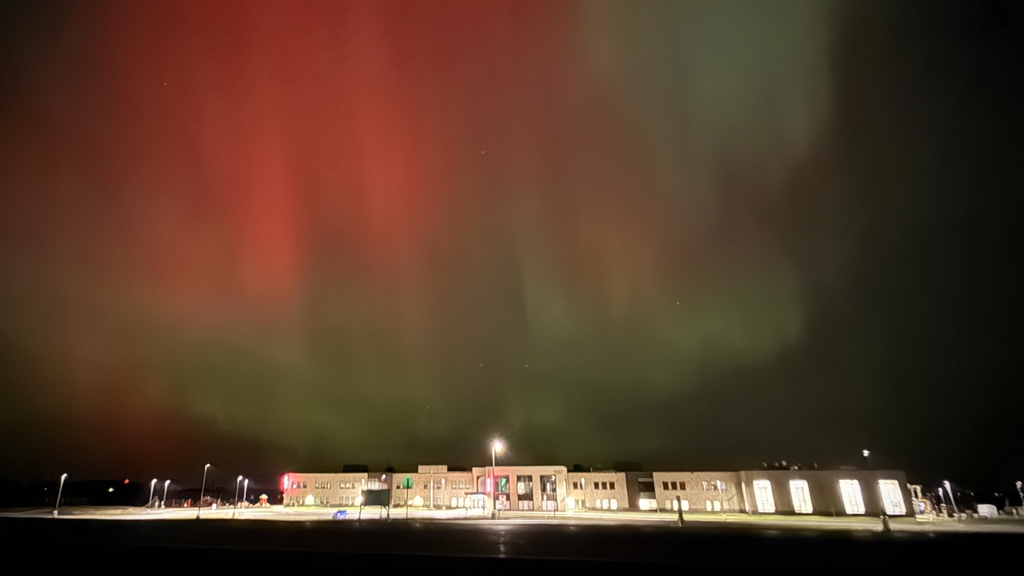 School under northern lights