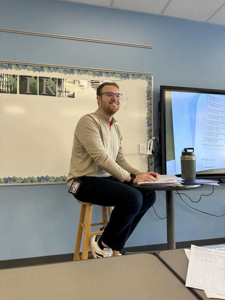 Substitute teacher at the front of a class