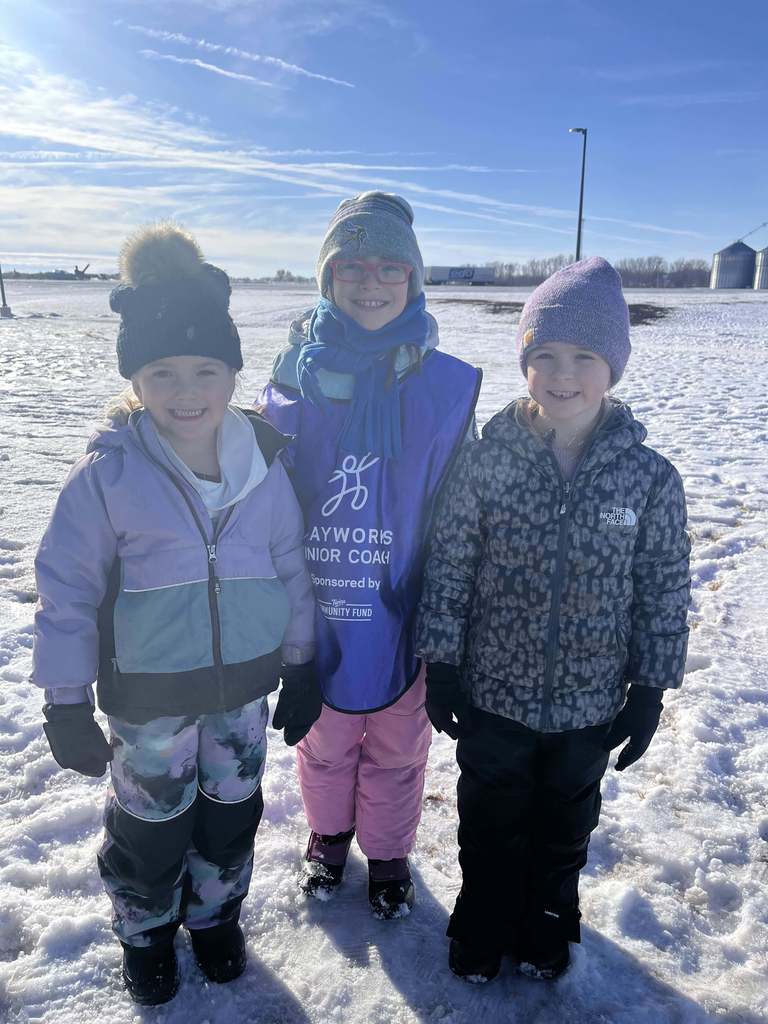 Students at recess in the snow