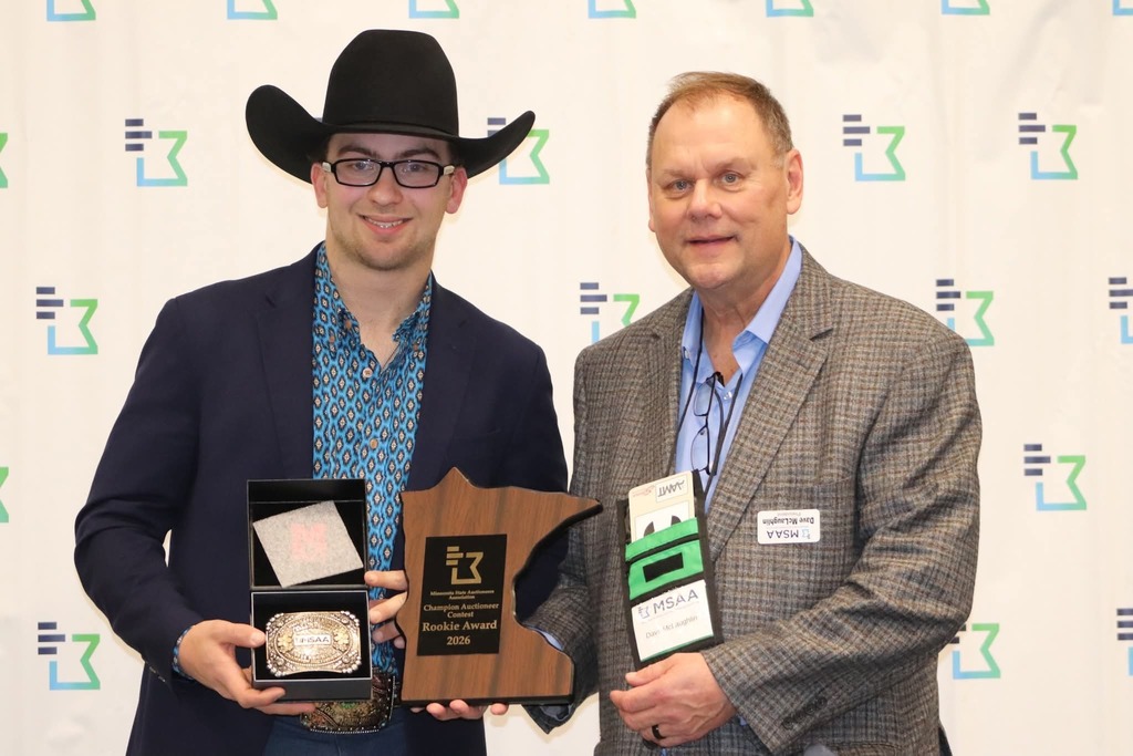 Lane receiving an award