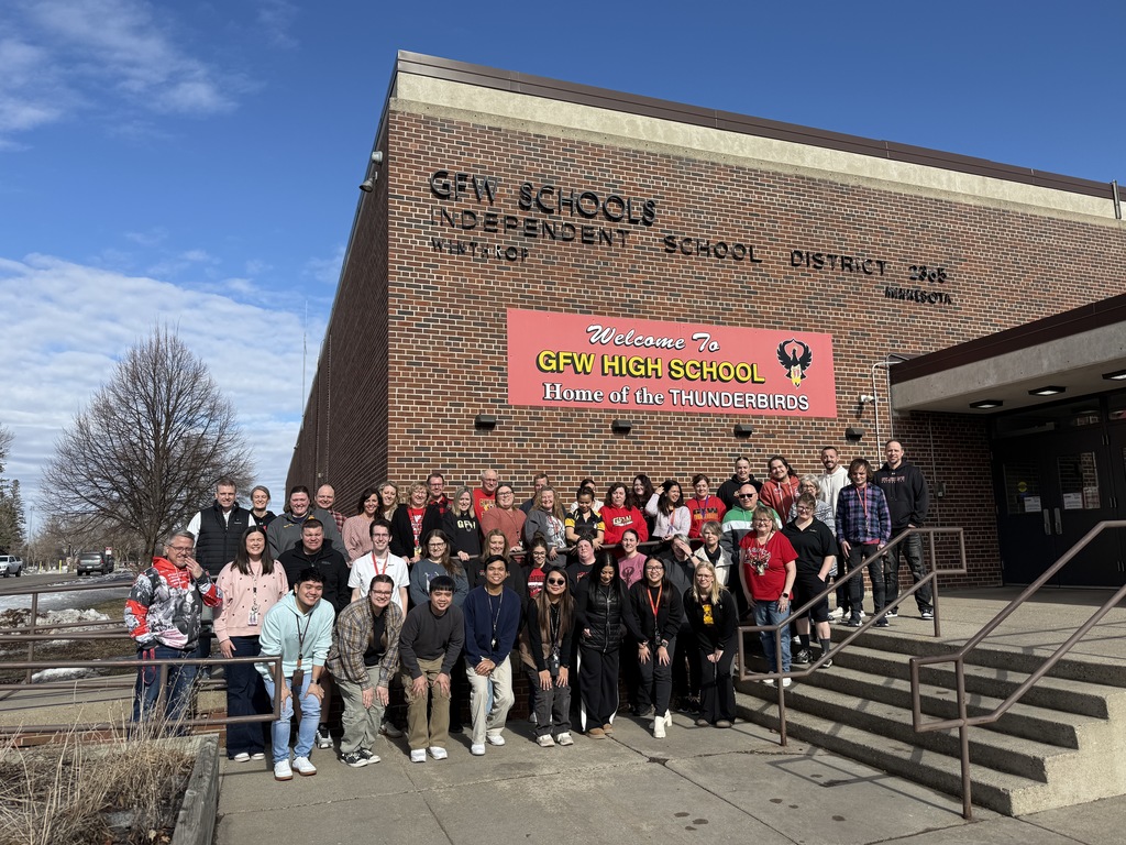 Staff outside building