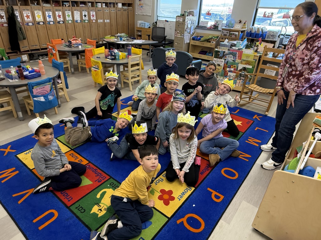 Students with paper crowns