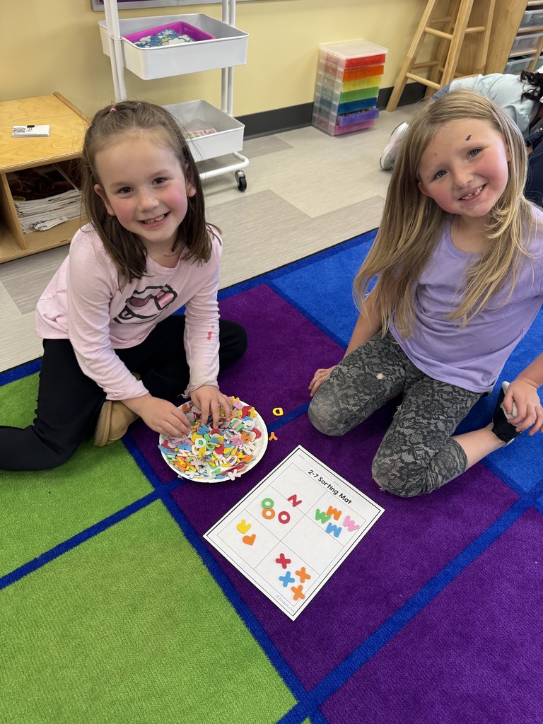 students doing a letter activity 