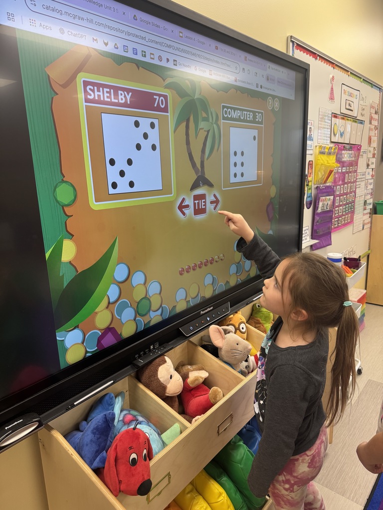 Studnet playing game on screen