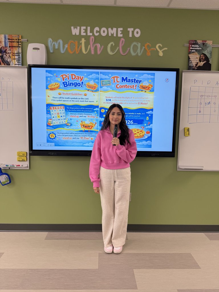 Student in front of class with microphone