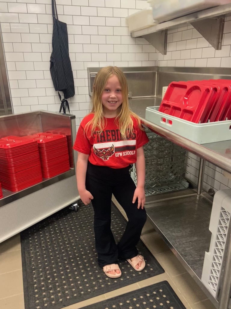Student helper in kitchen